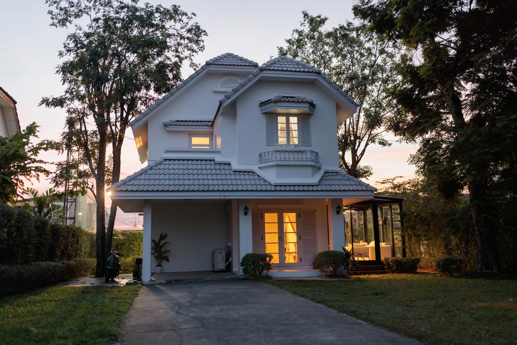 Exterior of a charming residential house at dusk